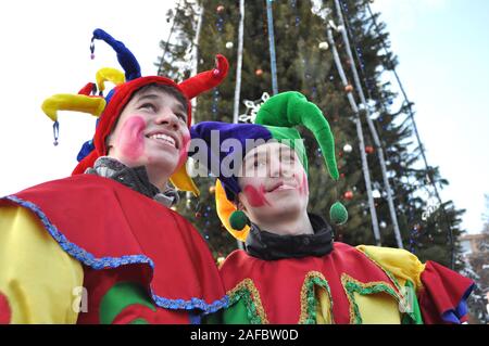 Cherkasy, Ukraine,December,24, 2011:Animators    took part in New year show in the city square near the Christmas tree Stock Photo
