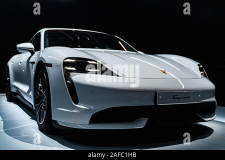 Porsche Taycan - the first all-electric sports car by the German automobile manufacturer Porsche on an exclusive Porsche exhibition in London. Stock Photo