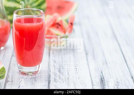 Homemade Watermelon Smoothie on an wooden table (selective focus) as detailed close-up shot Stock Photo