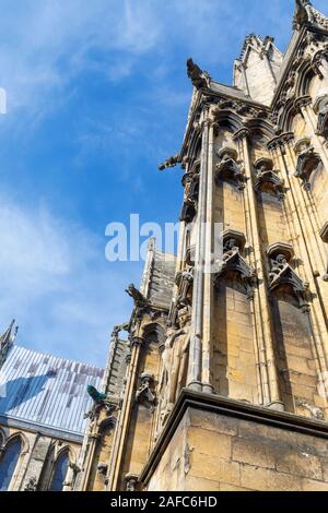 View of the Gothic architecture and stonework of Lincoln Cathedral in the city of Lincoln, Lincolnshire, East Midlands, England, UK Stock Photo