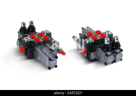 Two section Hydraulic distributor of the tractor on isolated white background with shadow Stock Photo