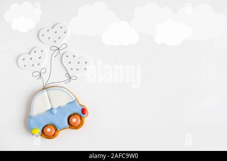 A photo of a typewriter flying on balloons. Greeting card for children, newborns. Children's banner. Stock Photo