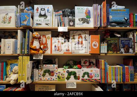 Judith Kerr Mog & Tiger Who Came to Tea and Hungry Caterpillar book display on book shelves in a bookstore in London England UK  KATHY DEWITT Stock Photo