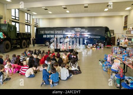 Washington, United States Of America. 09th Dec, 2019. First Lady Melania Trump delivers remarks at a Toys for Tots Christmas Event Monday, Dec. 9, 2019, at Joint Base Anacostia-Bolling in Washington, DC People: First Lady Melania Trump Credit: Storms Media Group/Alamy Live News Stock Photo