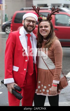 Lower East Side, New York, USA, December 14, 2019 - Thousands of People Dressed in Santa Claus, Reindeer, Elves and Grinch Participate on the 2019 Santacon Festival Today in New York City. Photo: Luiz Rampelotto/EuropaNewswire PHOTO CREDIT MANDATORY. Stock Photo