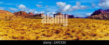 Panorama View of the Red Sandstone Mountains seen from the Kolob Terrace Road to the 8,000 ft altitude of the Kolob Plateau in Zion National Park, UT Stock Photo