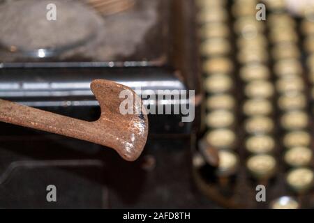 old typewriter rusted and dust covered detail Stock Photo