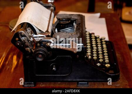 old typewriter rusted and dust covered detail Stock Photo
