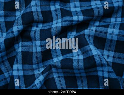 texture of checkered fabric pattern background toned classic blue color Stock Photo
