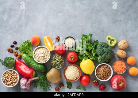 Healthy Vegan Food Background - organic food, top view, copy space. Selection of healthy clean eating, diet  or detox concept. Stock Photo