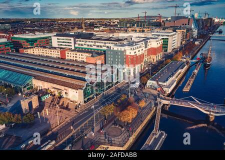 Aerial Dublin city view over Liffey River,Sean O' Casey Bridge and Epic building Stock Photo