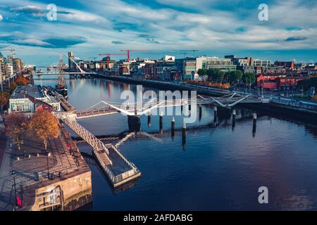 Aerial Dublin city view over Liffey River.Samuel Beckett and Sean O' Casey Bridge Stock Photo