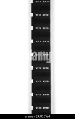 Detail of super 8 mm film strip black and white movie with the end text on black cinema background Stock Photo