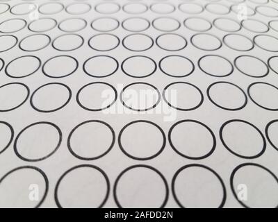 pattern of small black circles on white paper or background Stock Photo