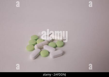 Pharmaceutical industry concept. Antibiotic drug resistance, prescription for treatment medication. Pharmacy theme, capsule pills . Stock Photo