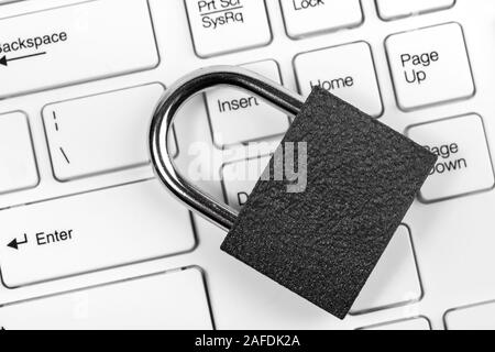 Black padlock on computer keyboard. Data protection concept Stock Photo
