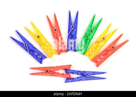 Household clothes pins on white background. Set of color plastic clothespins Stock Photo