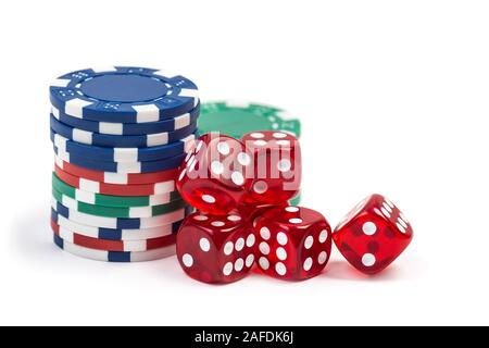 Group of red gambling casino dice and chips isolated on white background Stock Photo