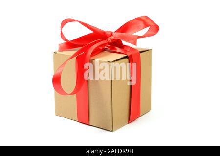 Cardboard gift box with red ribbon bow isolated on white Stock Photo