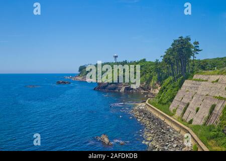 Scenery of Tojinbo cliff and tojinbo tower in Fukui prefecture, Japan Stock Photo