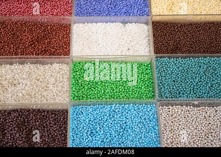 Beans in boxes multi-colored of different sizes and styles sold n local market in Greece Stock Photo
