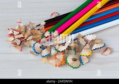 Sharpened color pencils and shavings on a light background close-up Stock Photo