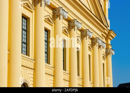 Yellow, neoclassical facade of the Debrecen Reformed Great Church with columns and Ionic style chapiters on a sunny day. Stock Photo