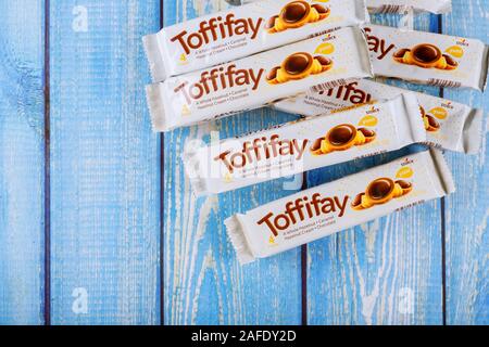 New York NY NOV 29 2019: Box of Toffifee caramel candy on old wooden table. Stock Photo