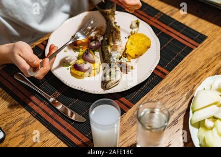 Turkish Bluefish with Raki / Lufer Fish. Traditional Seafood. Stock Photo