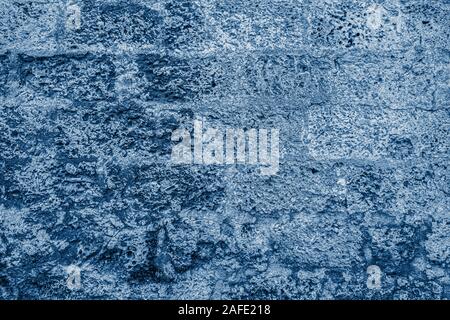 Background of stone wall. Classic Blue abstract background. Color of the year 2020. Stock Photo