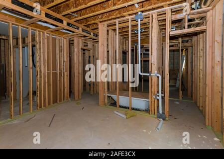 Basement unfinished under construction residential home framing stick built frame Stock Photo