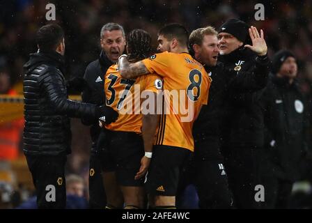 Wolverhampton Wanderers' Adama Traore (37) celebrates his sides first goal with the bench during the Premier League match at Molineux, Wolverhampton. Stock Photo