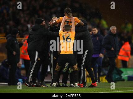 Wolverhampton Wanderers' Adama Traore (37) celebrates his sides first goal with the bench during the Premier League match at Molineux, Wolverhampton. Stock Photo