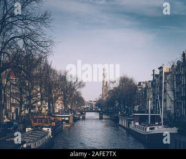Amsterdam autumn in the morning, old city centre, bridge, canals of Amsterdam Stock Photo