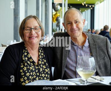Middle age couple (seniors) dining out and having fun Stock Photo