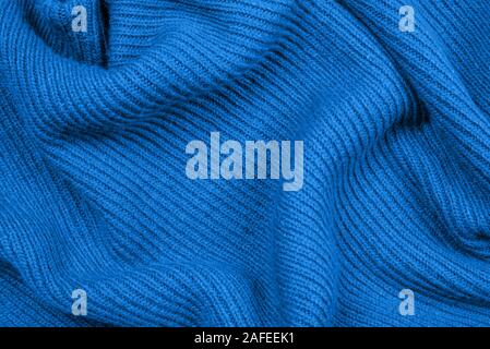 Blue knitted fabric texture for your background. Stock Photo
