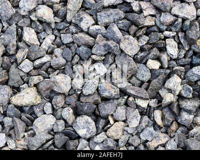 Background from gray small stones. Caucasus Stock Photo