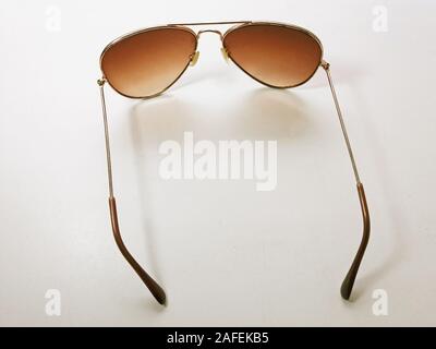 Sunglasses on white background for summer, sea. Stock Photo