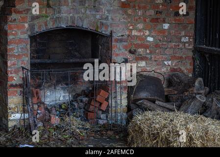 abandoned old English house with smoky fireplace Stock Photo