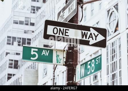 Nyc Street signal. 5th Ave. with 58th St, and Liberty Statue picture. Travel and transportation concept. New York City. United States. Stock Photo