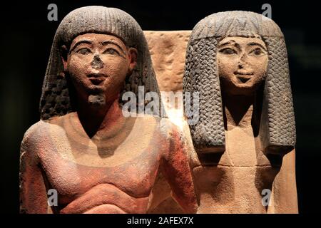 Egyptian Mummies Exhibition Exploring Ancient Lives at Montreal Museum of Fine Arts. Group a statues of a Egyptian priest and his wife. Stock Photo
