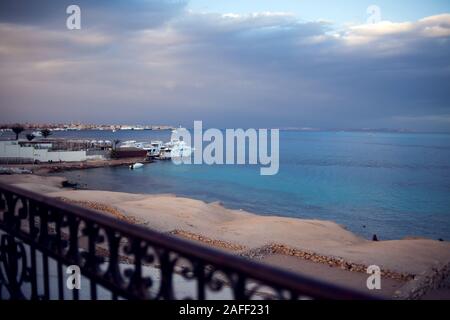 The view of Red sea with ship and cloudly sky before rain in Hurhgada. Nature and weather concept Stock Photo