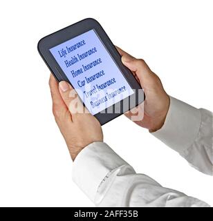 Selecting insurance on tablet PC Stock Photo