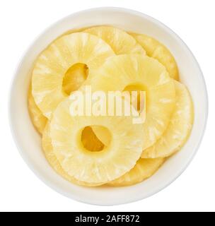 Fresh made Preserved Pineapple Rings isolated on white background; close-up shot Stock Photo
