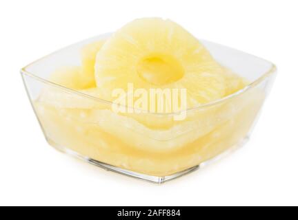 Fresh made Preserved Pineapple Rings isolated on white background; close-up shot Stock Photo