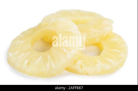 Portion of Preserved Pineapple Rings as detailed close-up shot isolated on white background Stock Photo
