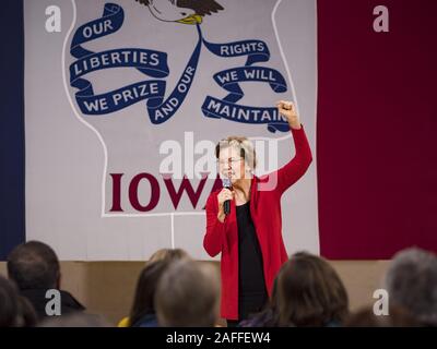 Washington, Iowa, USA. 15th Dec, 2019. US Senator ELIZABETH WARREN (D-MA) speaks to a crowd of about 200 people during a campaign event at Washington Middle School in Washington, IA, Sunday. Warren is campaigning in southeastern Iowa this weekend to support her effort to be the Democratic nominee for the US presidential race in 2020. Iowa traditionally hosts the first presidential selection event of the campaign season. The Iowa caucuses are Feb. 3, 2020. Credit: Jack Kurtz/ZUMA Wire/Alamy Live News Stock Photo