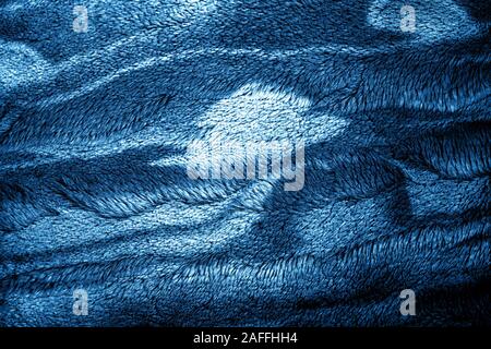 Classic Blue color of the Year 2020 inscription. Faivorite colour of the New Year. Cloth colored in classic blue color. Concept for home design, interiors. Stock Photo