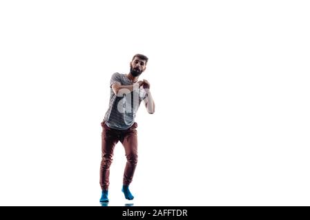 Muscular dance performer practicing dance moves at the studio Stock Photo