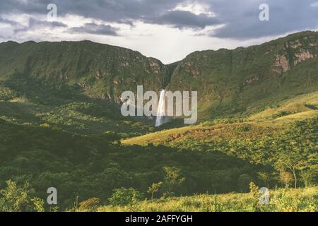 A dense waterfall in a amazing tropical forest with a big canyon in Serra da Canastra National Park in Minas Gerais, Brazil Stock Photo